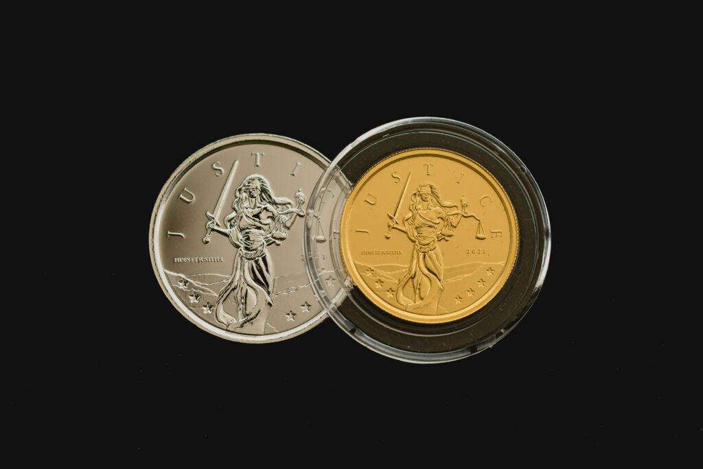 Gold and silver coins displayed for a Goldco precious metals IRA